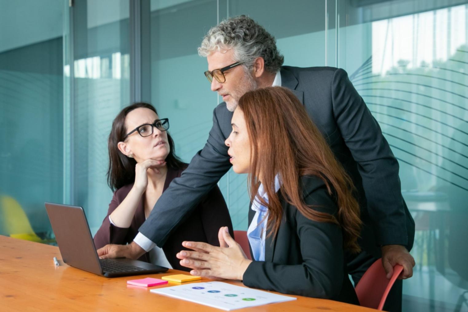 Students collaborating in financial planning workshop